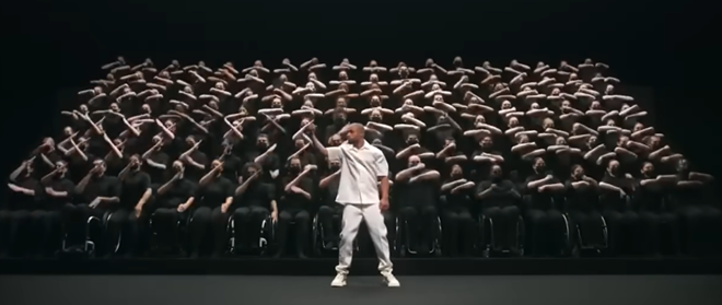 Snapshot of Sadeck Waff’s performance and his group, taken from YouTube (https://www.youtube.com/watch?v=ekibVX3gK5Q)